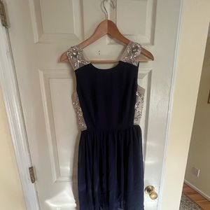 I am selling a navy size 3 dress for $20.